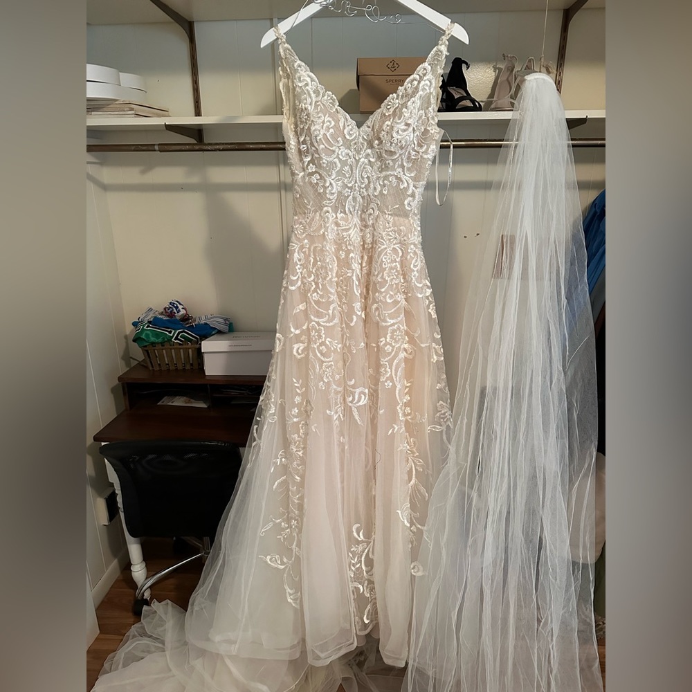 Jasmine Couture wedding and veil. Worn once, bought for $2400 and veil for $250